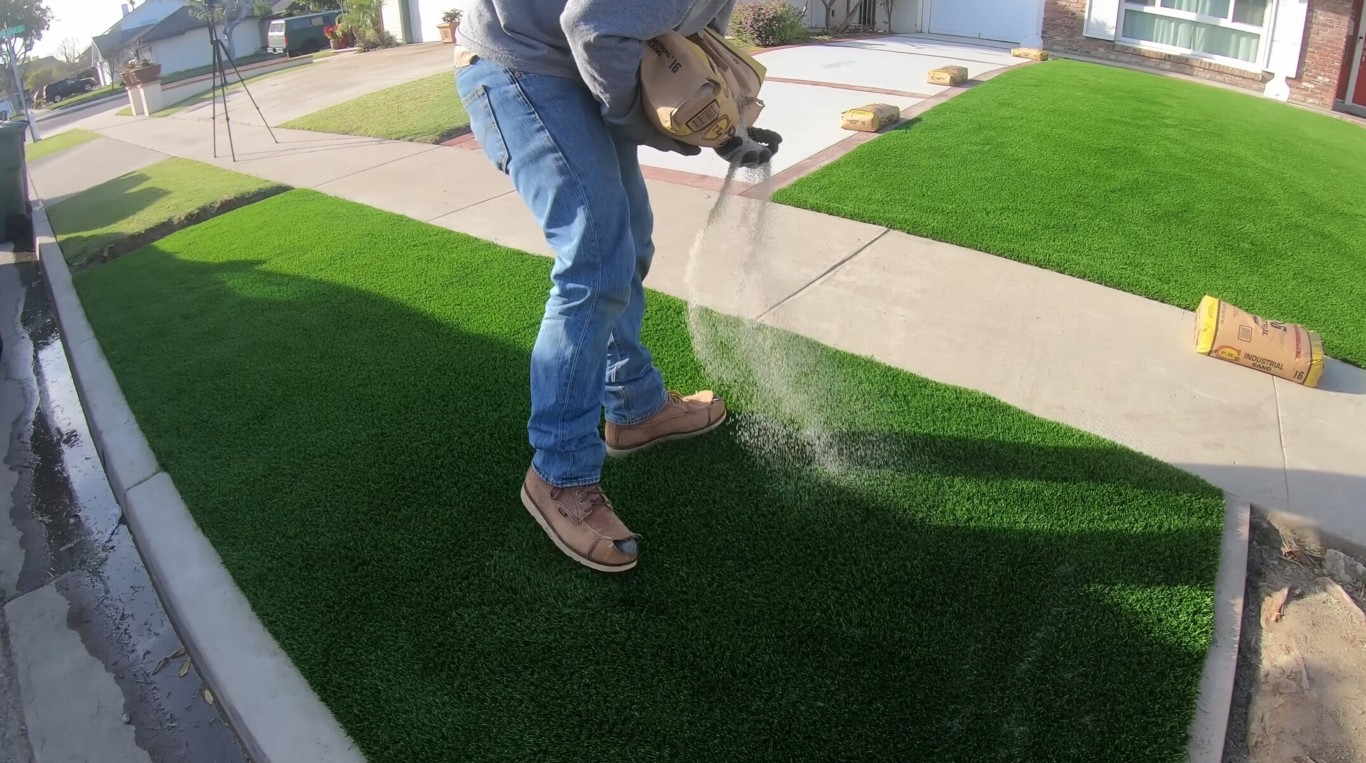 Professional artificial grass installation eliminating mud in Delano, CA front yard
